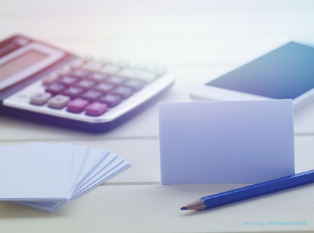 Notecards, Pencil & Calculator Ready For Roofing Company Brand Development